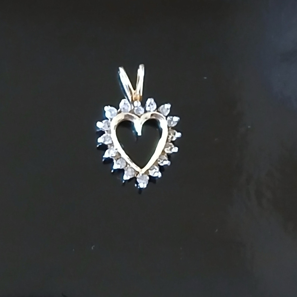 Elegant 10k Gold Heart Pendant with Diamond Detailing